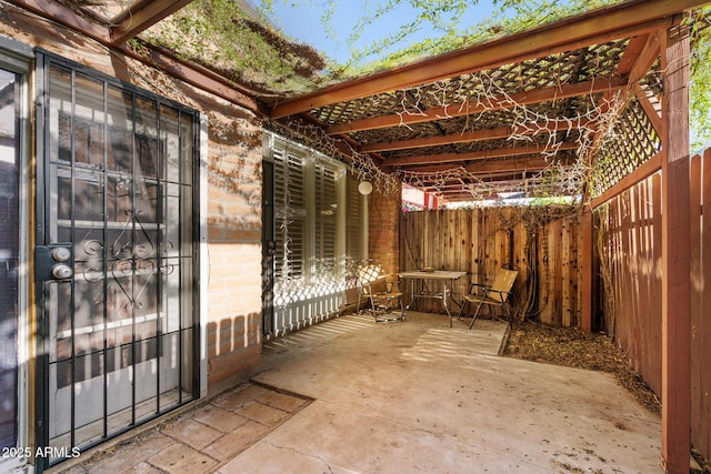 view of patio / terrace with fence