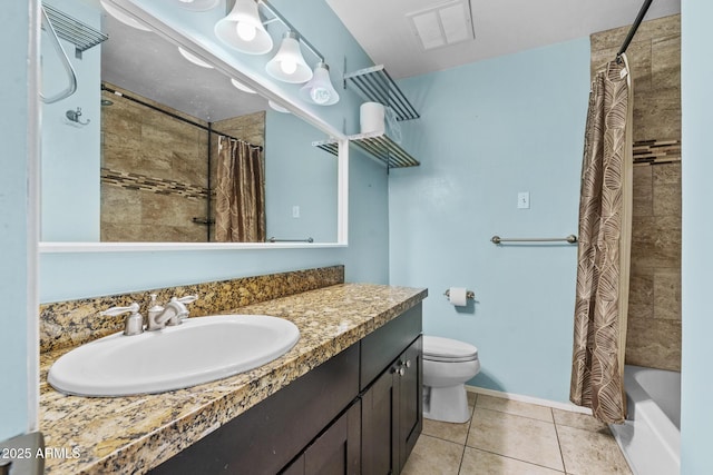 bathroom with vanity, visible vents, shower / bath combo with shower curtain, tile patterned floors, and toilet