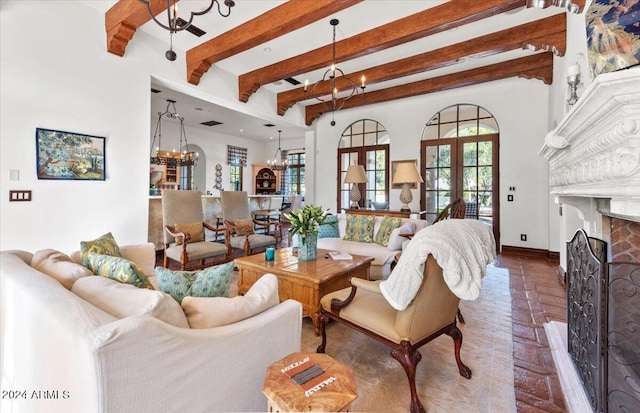 living room with beam ceiling, french doors, and a wealth of natural light