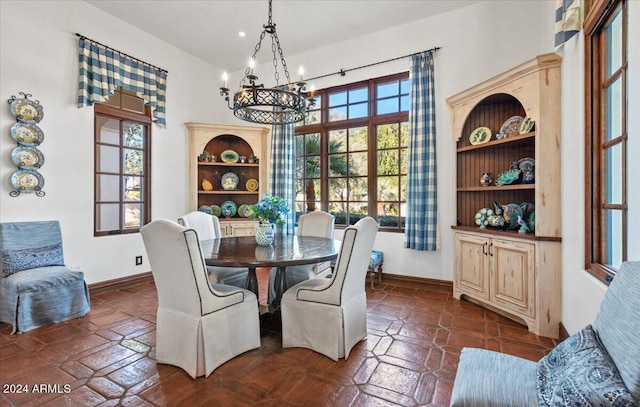 dining room with a chandelier