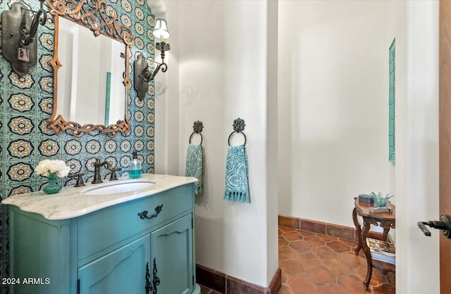 bathroom with vanity and tile patterned floors