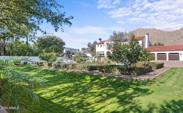 view of yard with a garage