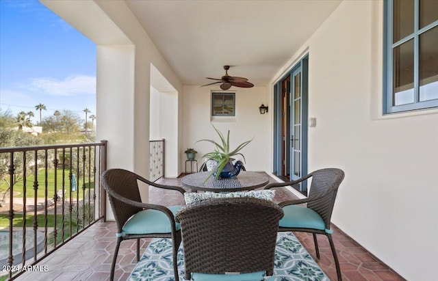 balcony featuring ceiling fan