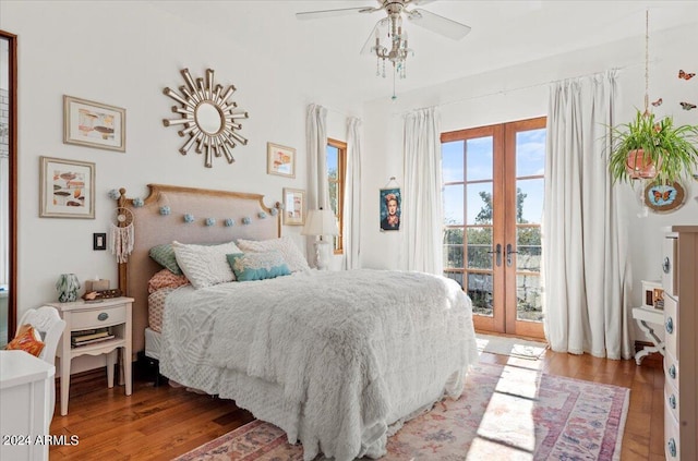 bedroom featuring access to exterior, ceiling fan, french doors, and wood-type flooring