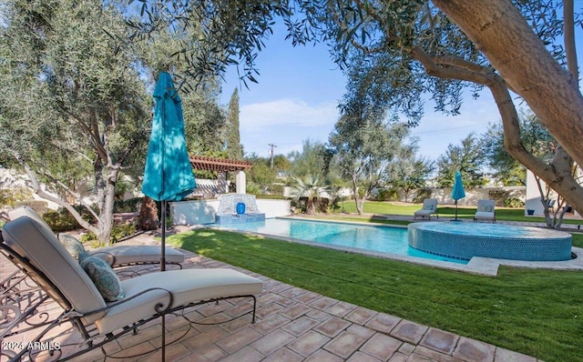 view of pool featuring a yard and a patio area