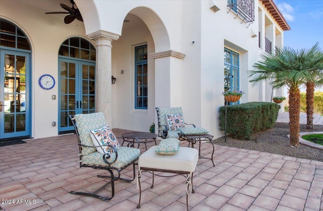 view of patio / terrace featuring ceiling fan and french doors