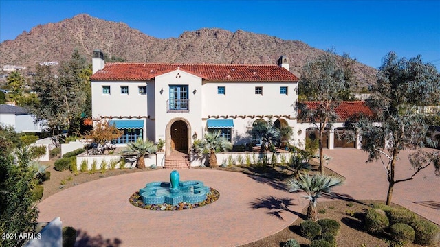 view of front of house with a mountain view