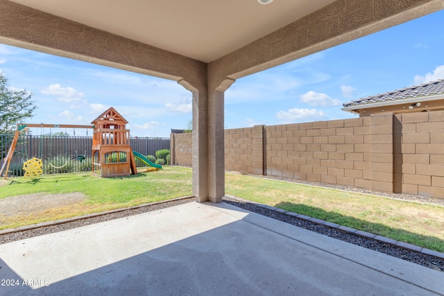 view of patio with a playground