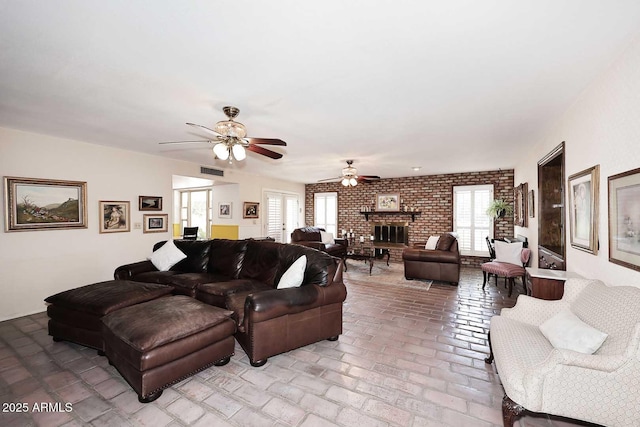 7537 W Bluefield Ave, Glendale, AZ 85308 - living area featuring ceiling fan, a brick fireplace, and brick floors
