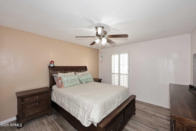 7537 W Bluefield Ave, Glendale, AZ 85308 - bedroom with light wood-type flooring, baseboards, and a ceiling fan