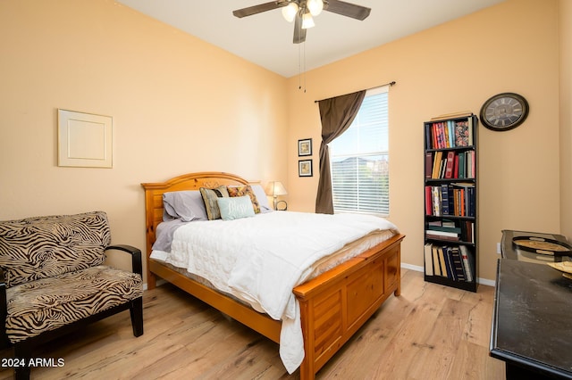 bedroom featuring light wood-type flooring and ceiling fan