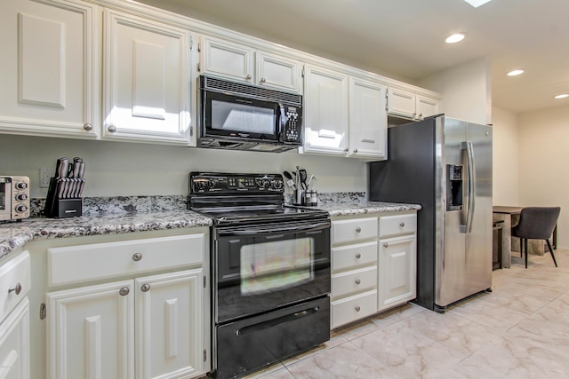 kitchen featuring light stone counters, white cabinets, and black appliances