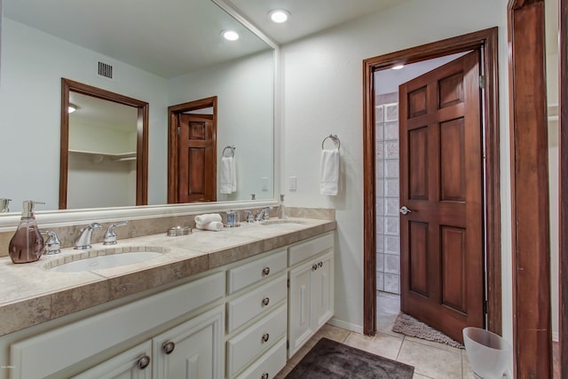 bathroom featuring vanity and tile patterned flooring