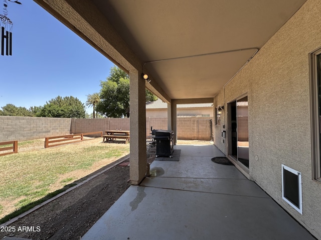 view of patio / terrace featuring a grill and a fenced backyard