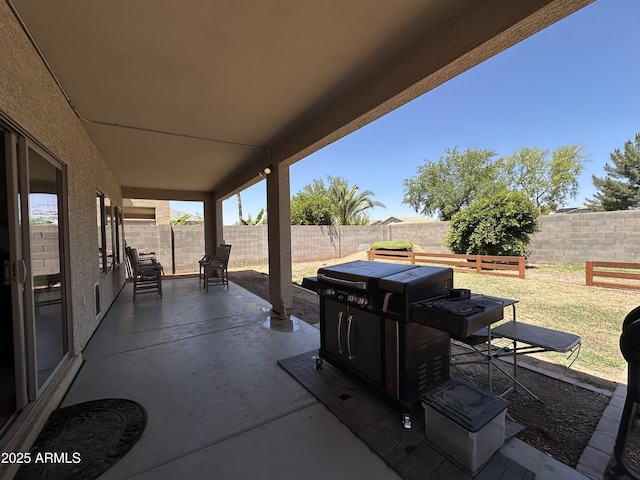 view of patio with a fenced backyard