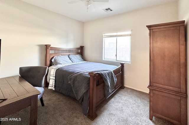 carpeted bedroom featuring visible vents and ceiling fan