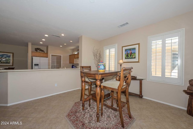 view of tiled dining space