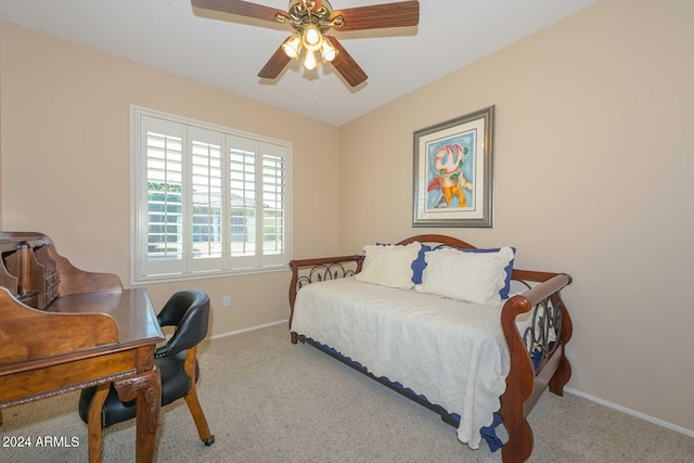 bedroom with light carpet and ceiling fan