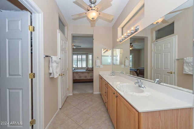 17041 W Artesia Dr, Surprise, AZ 85387 - full bathroom with connected bathroom, ceiling fan, baseboards, and a sink