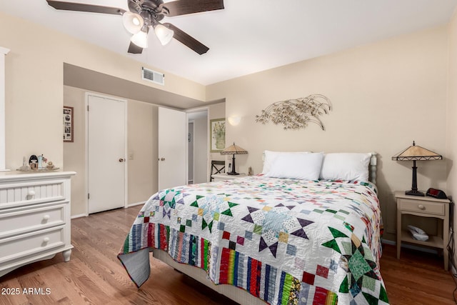 bedroom featuring ceiling fan and light wood-type flooring