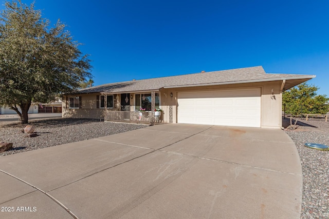 ranch-style house featuring a garage