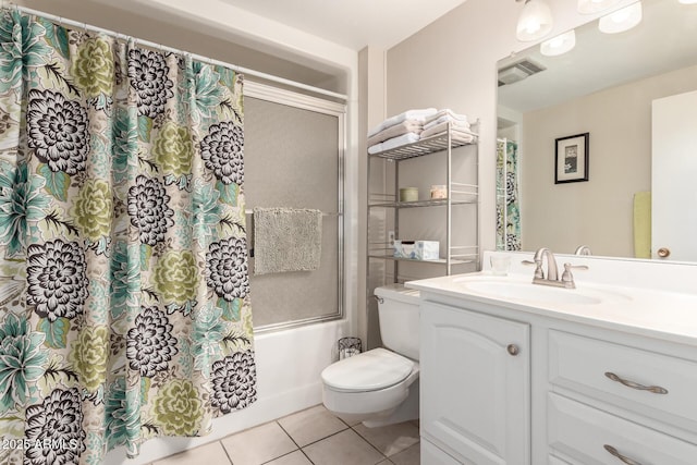 full bathroom featuring tile patterned flooring, vanity, shower / tub combo, and toilet