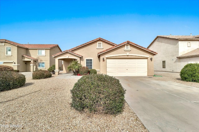 view of front of property with a garage