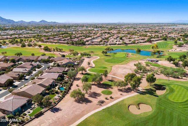 birds eye view of property with a residential view, golf course view, and a water and mountain view