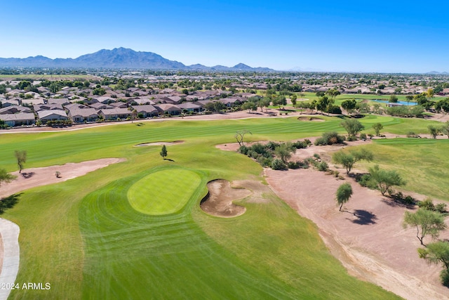 birds eye view of property featuring a mountain view, a residential view, and view of golf course