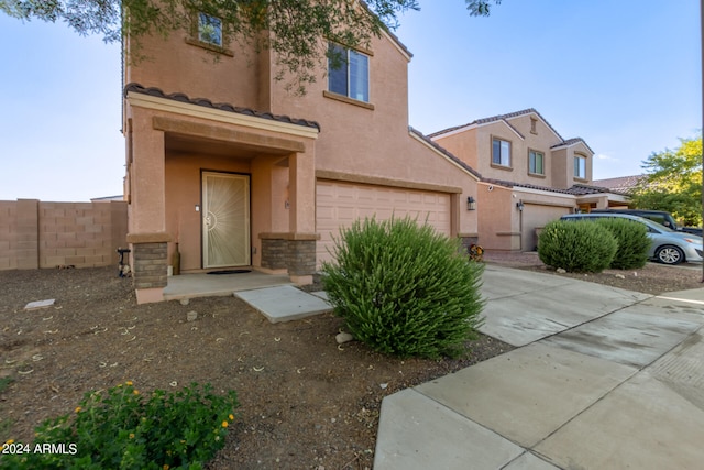 8690 S 253rd Ave, Buckeye, AZ 85326 - view of front facade with a garage