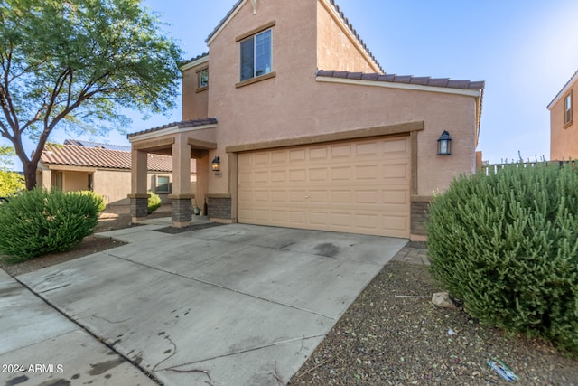 view of front of house with a garage