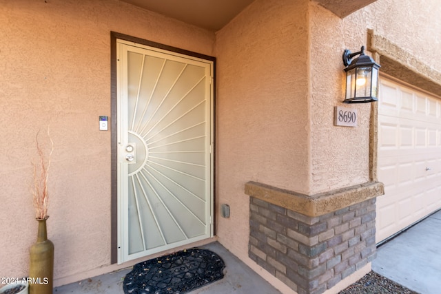 entrance to property with a garage