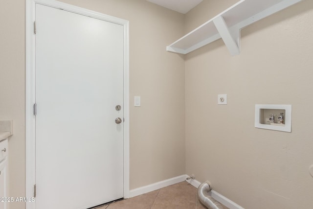 laundry room with baseboards, laundry area, light tile patterned flooring, electric dryer hookup, and washer hookup