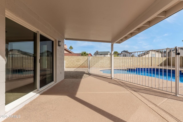 view of patio with a fenced in pool and a fenced backyard