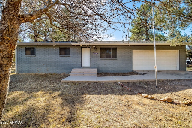 ranch-style house with a garage