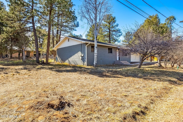 exterior space with a yard