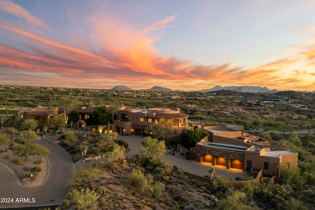 aerial view at dusk with a mountain view