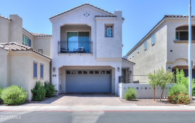 281 E Shamrock Dr, Chandler, AZ 85286 - mediterranean / spanish-style house with a balcony, stucco siding, an attached garage, and a tile roof