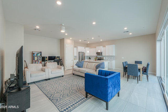 281 E Shamrock Dr, Chandler, AZ 85286 - living room with recessed lighting and light tile patterned flooring