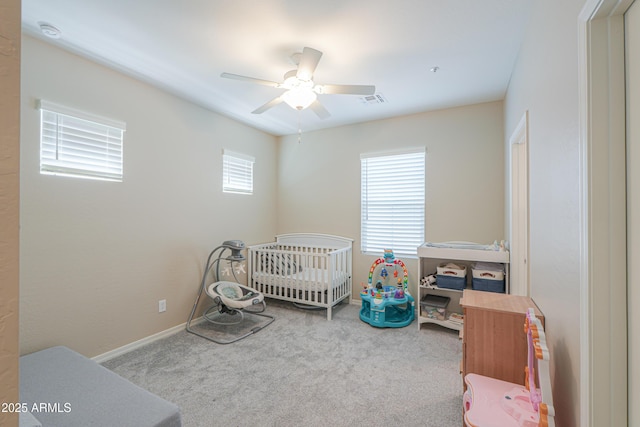 281 E Shamrock Dr, Chandler, AZ 85286 - carpeted bedroom featuring ceiling fan and a nursery area