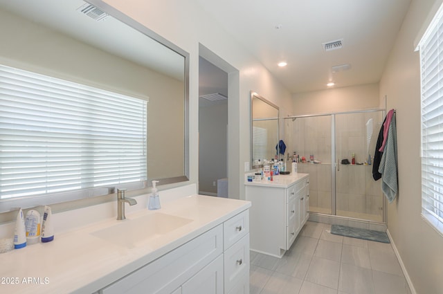 281 E Shamrock Dr, Chandler, AZ 85286 - full bath featuring vanity, tile patterned floors, a stall shower, recessed lighting, and plenty of natural light