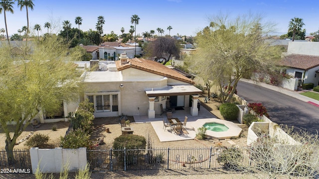 back of house featuring a patio