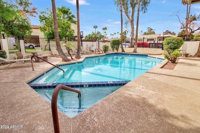 view of pool with a patio area