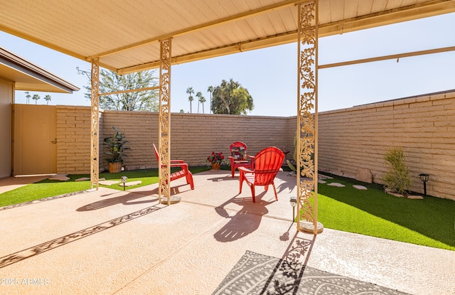 view of patio with a fenced backyard