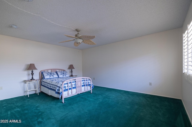 bedroom featuring carpet, a textured ceiling, and a ceiling fan