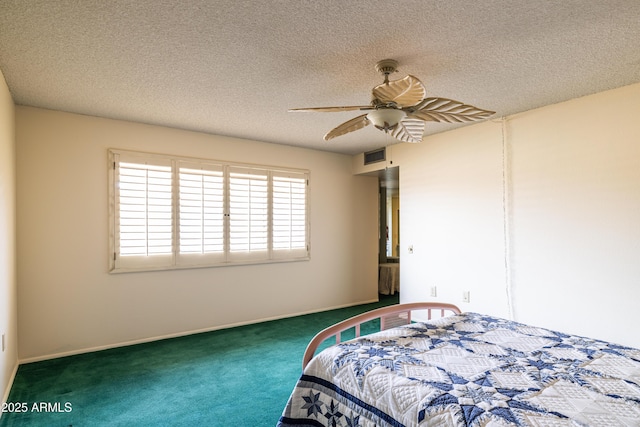 bedroom featuring baseboards, visible vents, ceiling fan, a textured ceiling, and carpet flooring