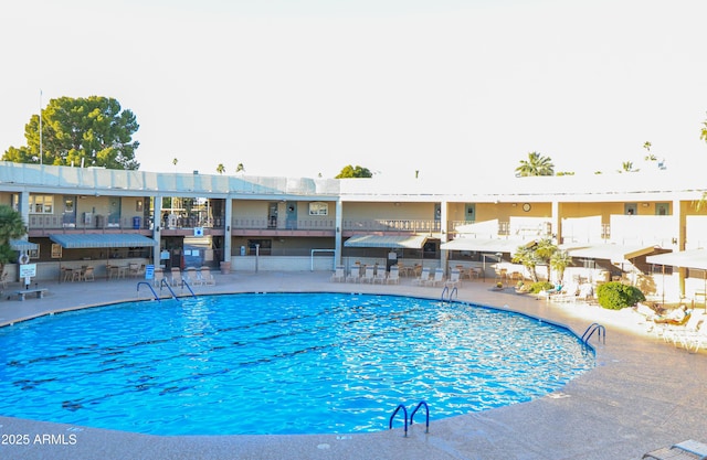 pool featuring a patio area