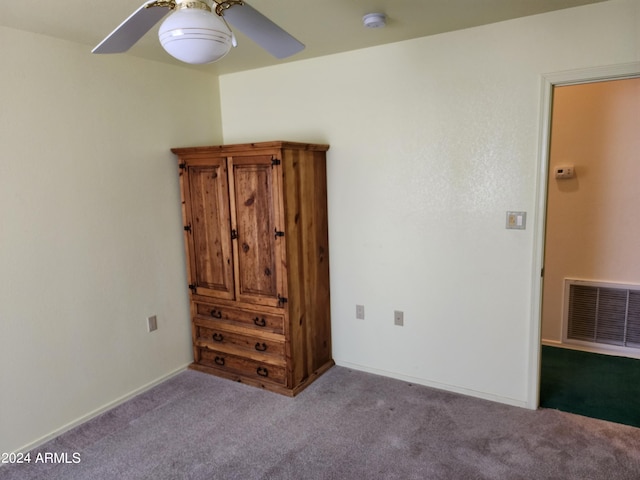 unfurnished bedroom with light carpet and ceiling fan