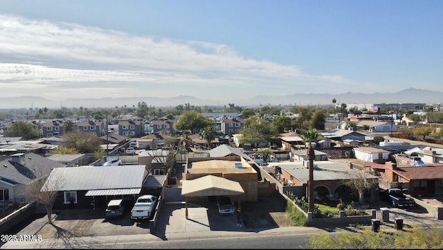 birds eye view of property with a residential view