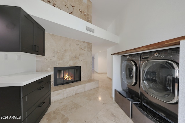 clothes washing area featuring separate washer and dryer